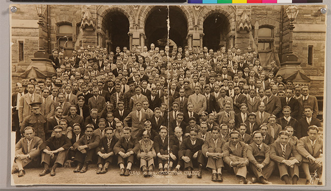 photograph of students in front of Healy Hall after conservation treatment