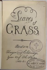Front page of a book with Leaves of Grass written in a stylized vegetal font