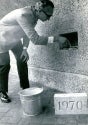 Photograph of University Librarian Joe Jeffs laying the LIbrary's cornerstone