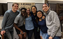 Students celebrate beating the clock in Lauinger Library's Escape Room
