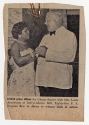 Newspaper clipping featuring Lucille Armstrong dancing with a British Press Officer