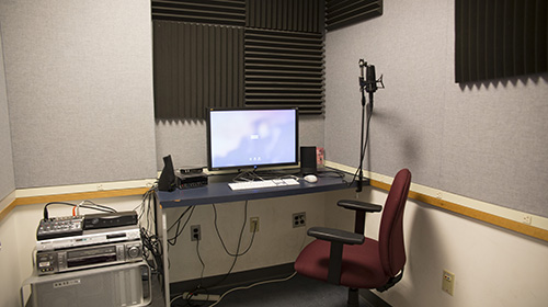 Editing room 3, showing the desk, chair, microphone, and multimedia conversion station