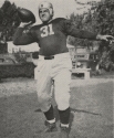 a black and white portrait of Jim Castiglia, Fullback 1938-1941 in football uniform.