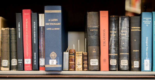 Miniature Books on Bookshelf