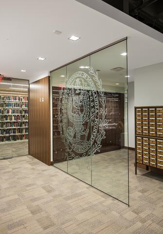 The Georgetown seal in front of lockers in the Center.