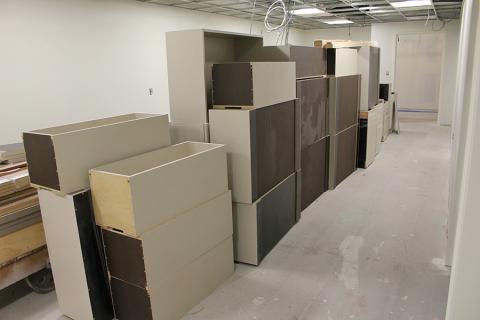 Cabinetry awaiting installation in the staff work room on November 7, 2014.