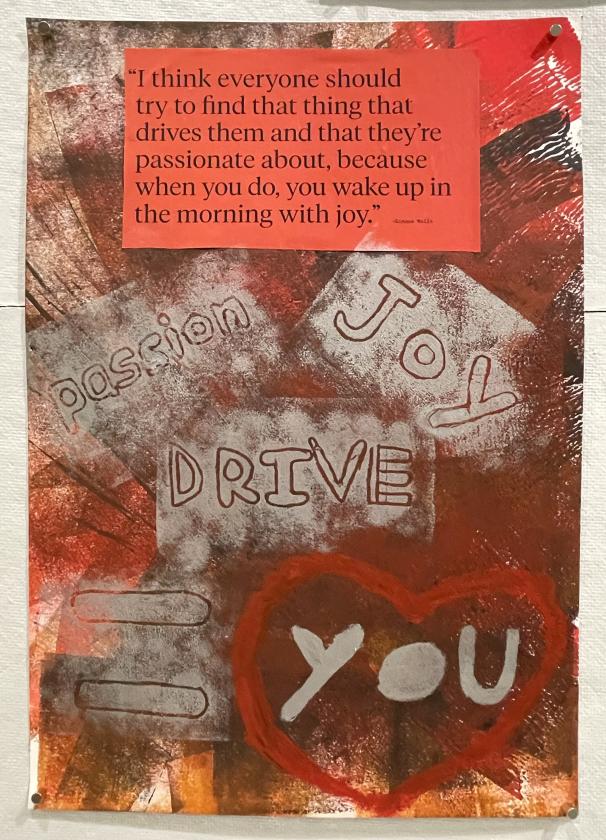 a maroon, reddish brown poster with the words "you", "drive", and "joy" beneath a block quote