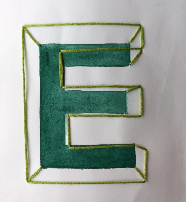 Embroidered letter "E"