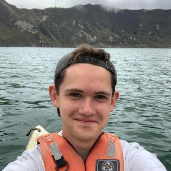 Matt Gardiner wears a life jacket on a kayak