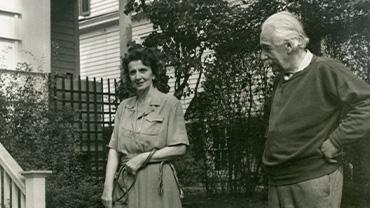Albert Einstein with his wife and dog.
