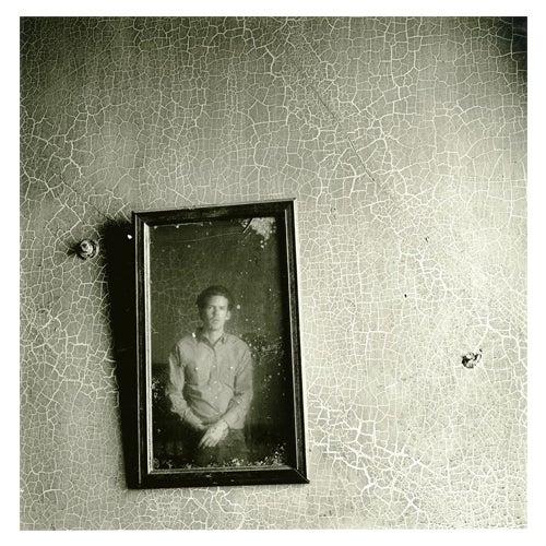 Man staring in a mirror